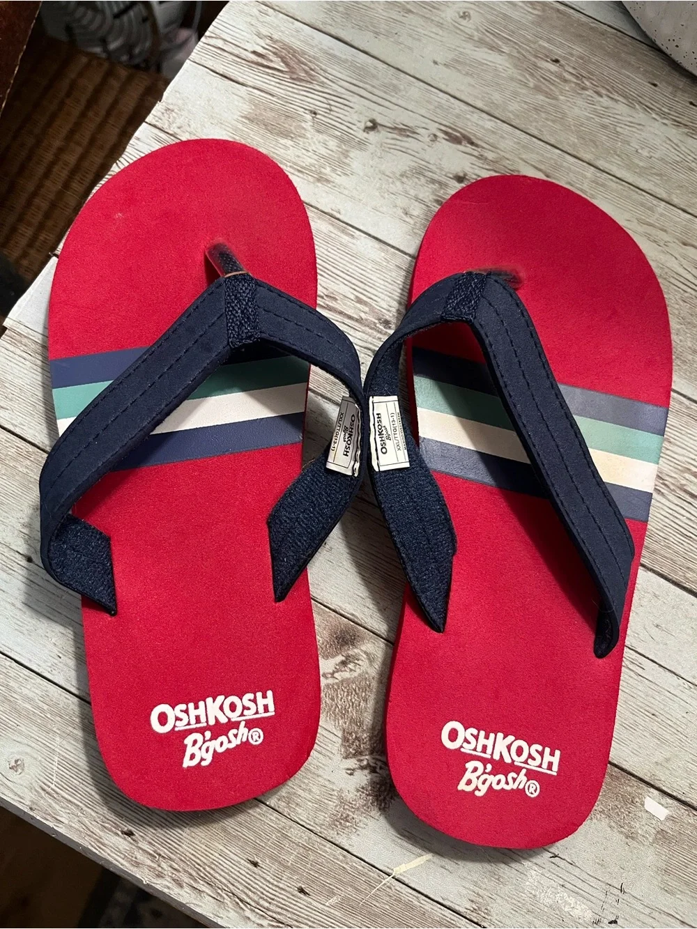 OSH Kosh flip flops